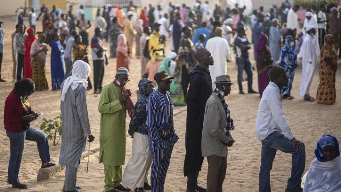 Senegalese begin voting on Sunday to elect new leader